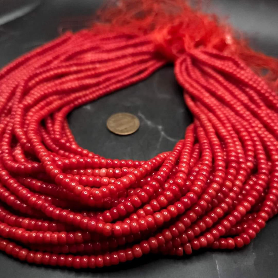 Red Bamboo Coral
4.5mm x 2.5mm rondelle, 16" strand