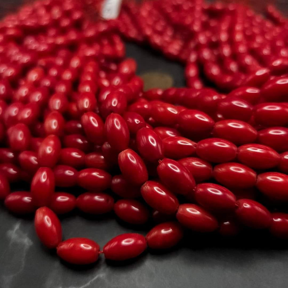Red Bamboo Coral
7mm x 11mm rice shape, 16" strand