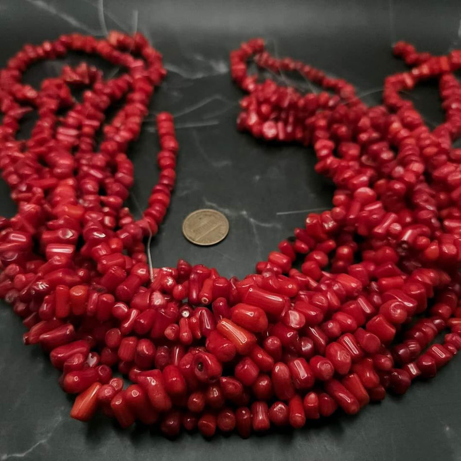 Red Bamboo Coral
10 to 12mm stubby branch, 16" strand