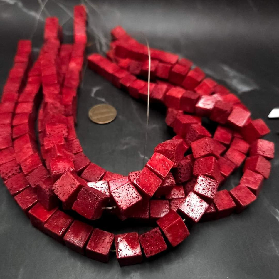 Red dyed sponge Coral
10mm cubes, 16 strand