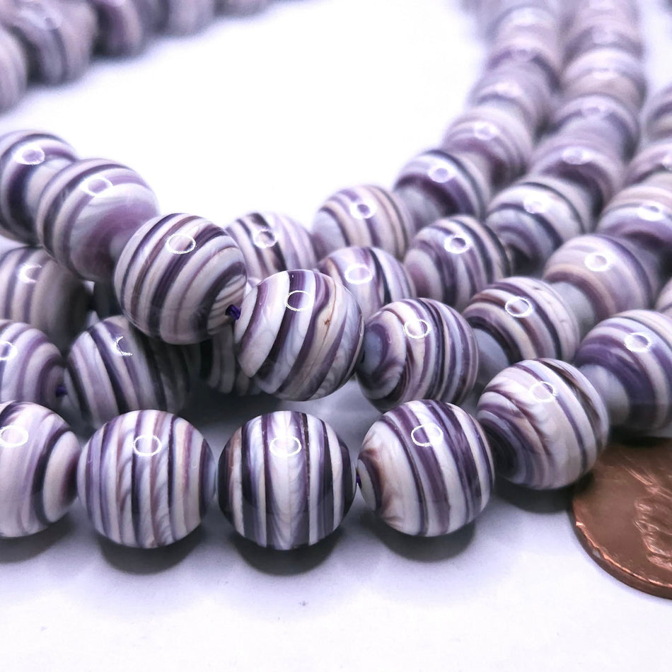 Wampum shell (Premium Quality)
12mm, per bead